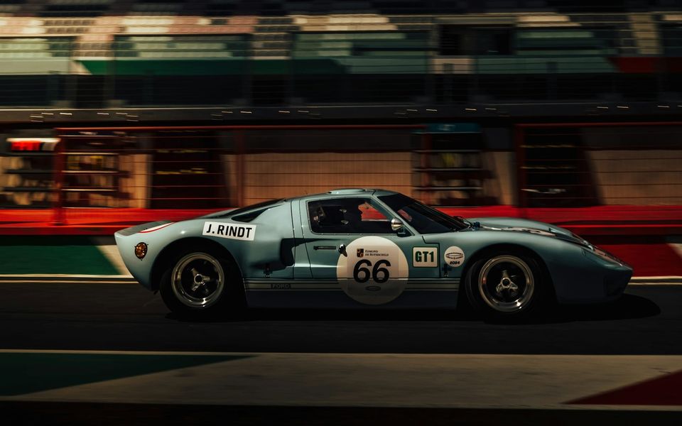 A Ford GT40 at speed on a race track