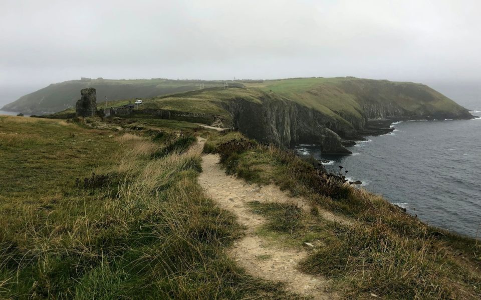 A grassy headland on the Irish coast