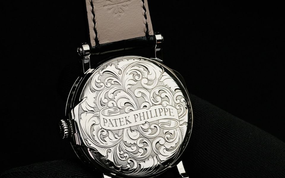 The hand-engraved case back of a Patek Philippe
